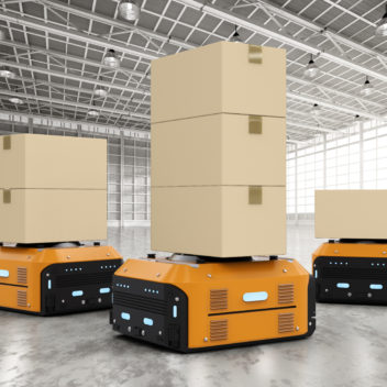 warehouse robots carry boxes